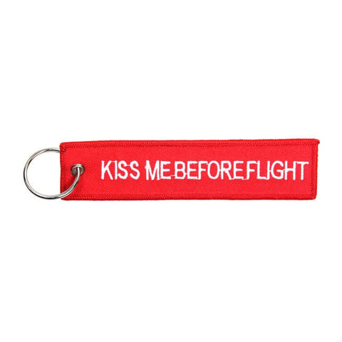 Atslēgu piekariņš KISS ME BEFORE FLIGHT red STOREHOUSE MOTOVEIKALS 21