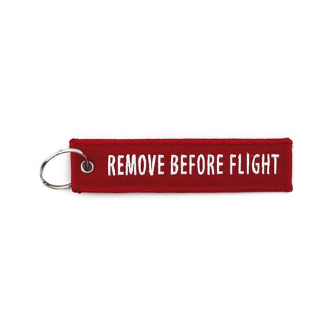 Atslēgu piekariņš REMOVE BEFORE FLIGHT RED STOREHOUSE MOTOVEIKALS 21